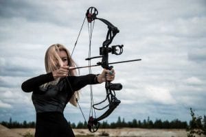 girl shooting a bow