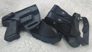 Black weapon holster with mag carrier
