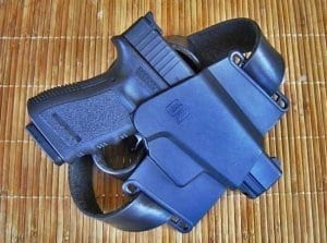 Photo of a glock in a holster, both blue